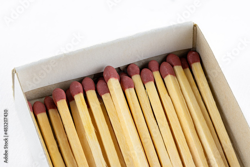Match sticks in a box on white background