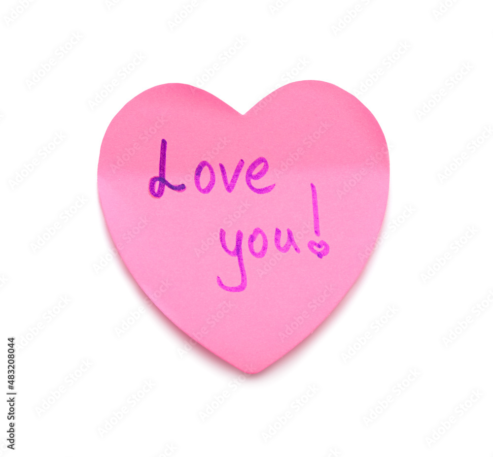 Heart shaped sticky note with text LOVE YOU on white background