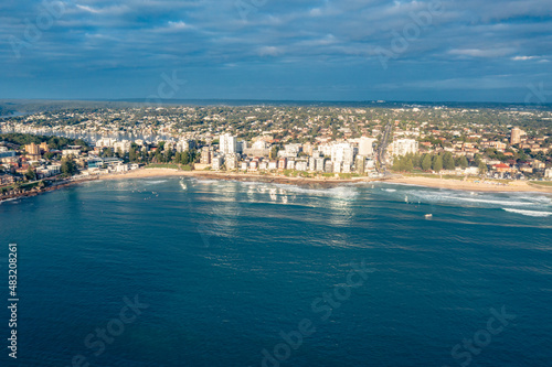 Aerial drone view of Cronulla and Cronulla Beach in the Sutherland Shire, South Sydney during summer in the early morning 