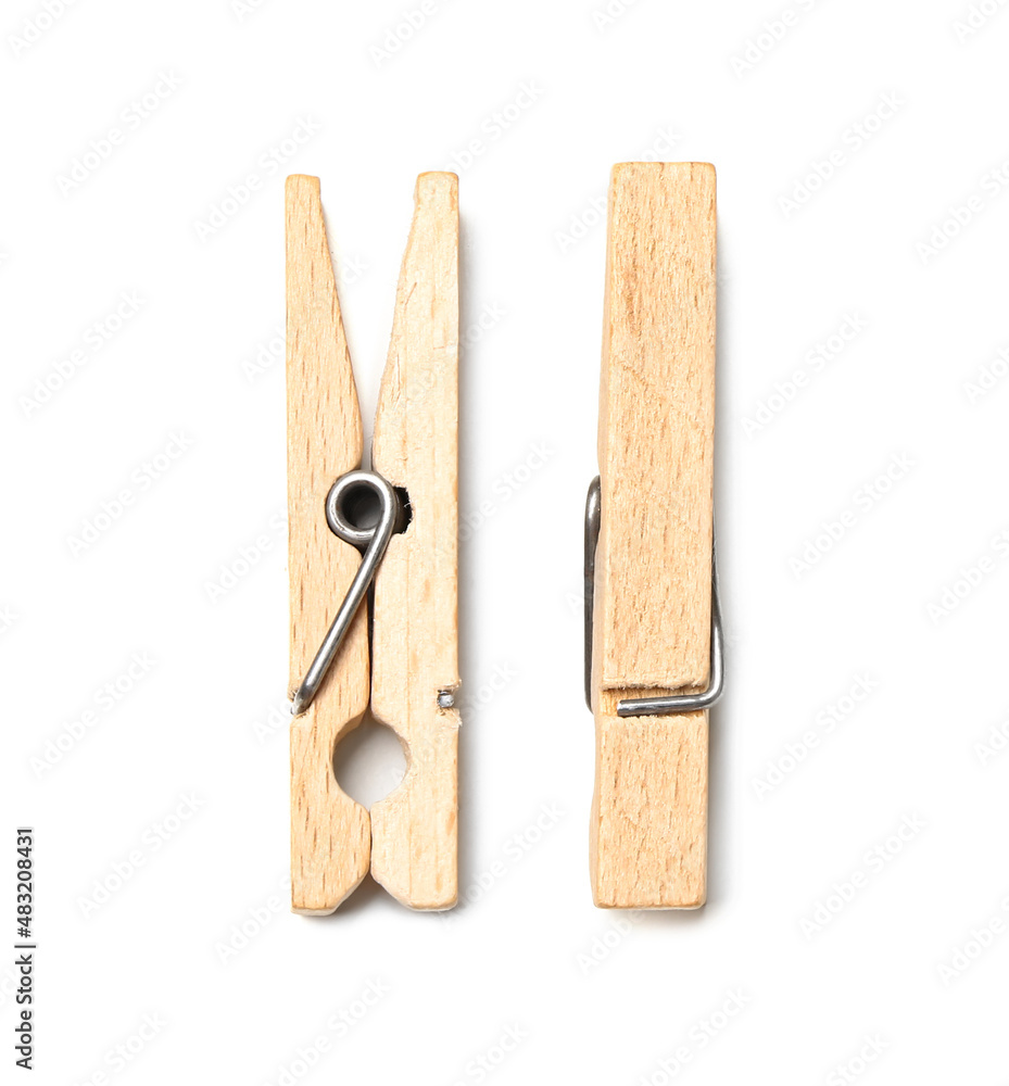 Wooden clothespins on white background Wooden clothespins on white background