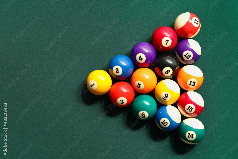 Different billiard balls on green table Different billiard balls on green table