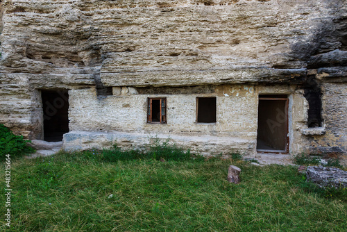 Rocky monastery with cells for monks. Background with copy space photo