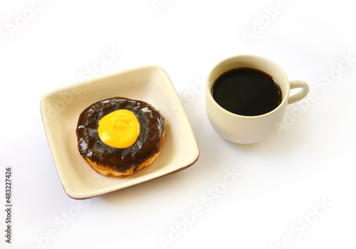 chocolate donut with cup of coffee photo