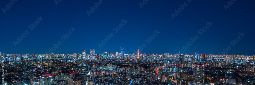 Ultra wide panorama image of Tokyo cityscape at magic hour.