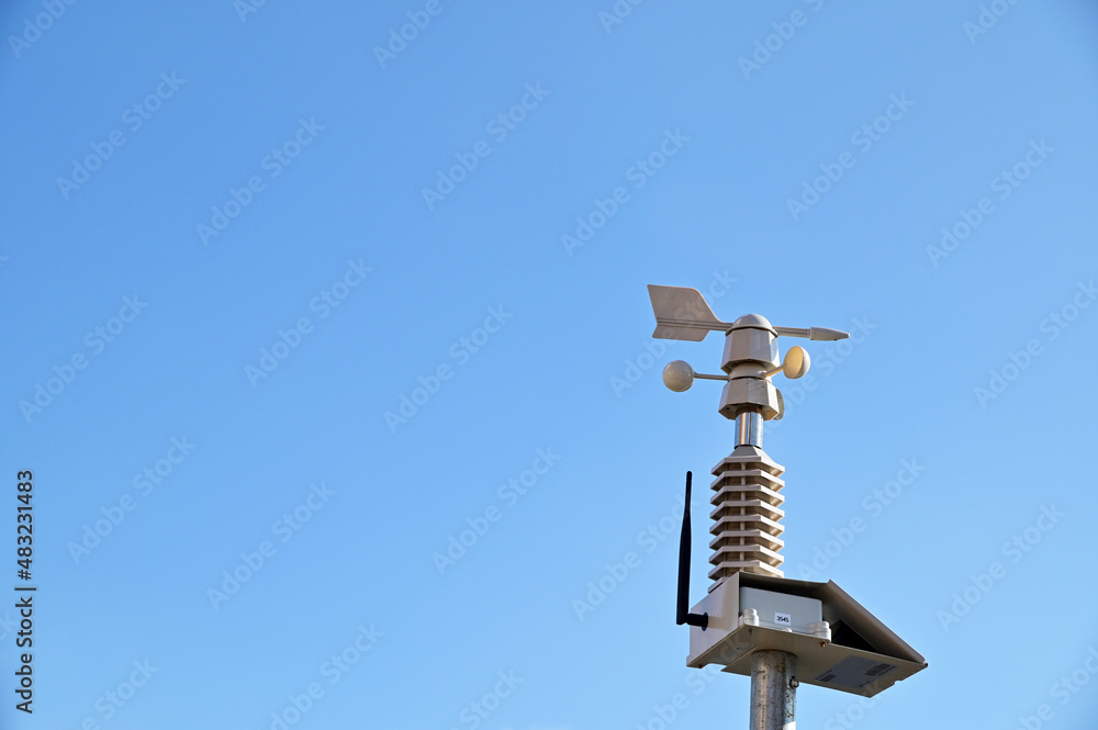 The Anemometer (Wind Speed Meter) with blue sky background - energy conservation concept from Thailand. The Anemometer (Wind Speed Meter) with blue sky background - energy conservation concept from Thailand.