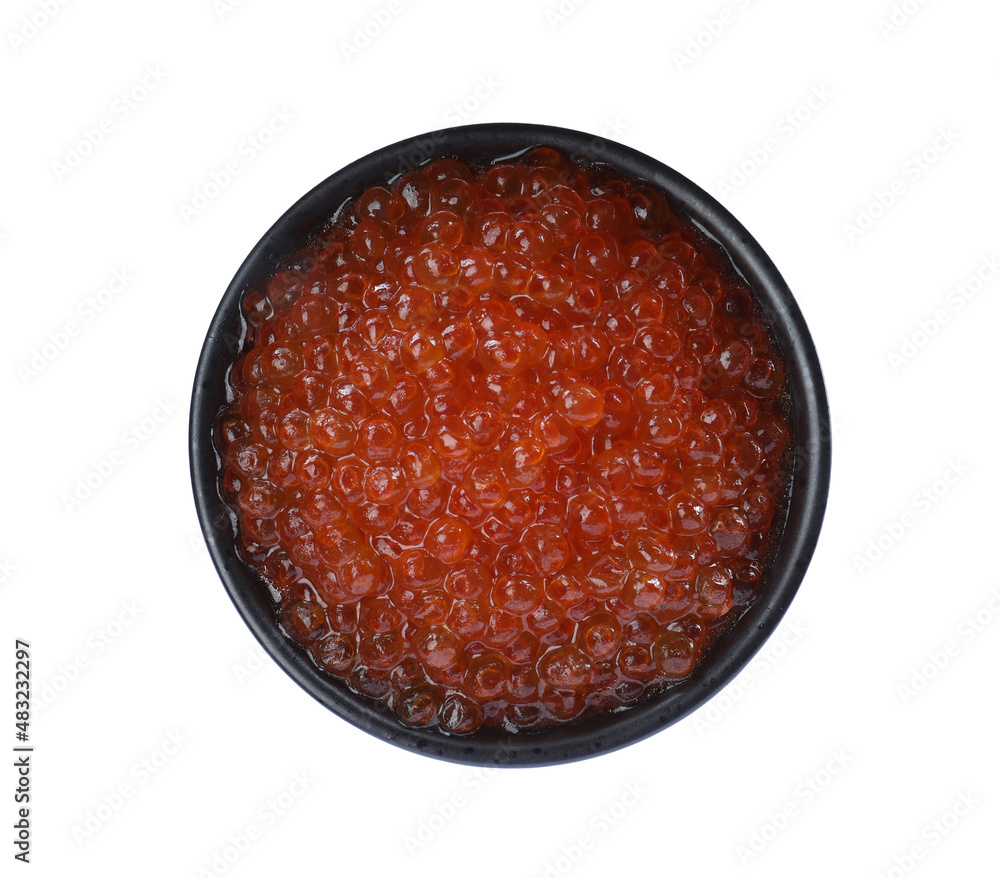 Bowl of delicious red caviar isolated on white, top view