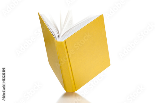 Open yellow cover book on white background photo