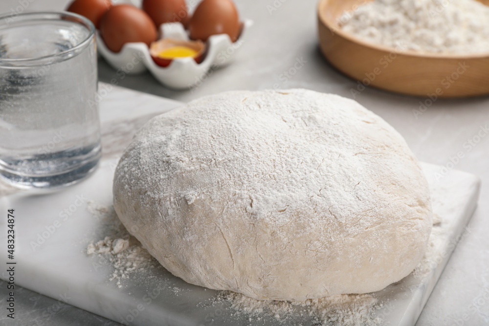 Dough on white marble board, closeup. Sodawater bread recipe Dough on white marble board, closeup. Sodawater bread recipe