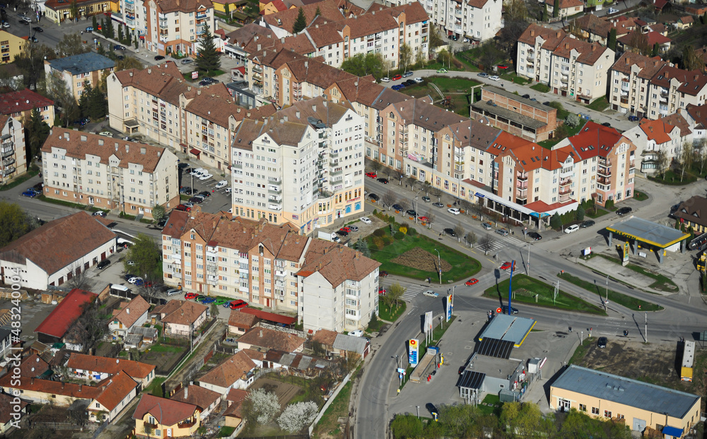Aerial view over Odorheiu Secuiesc city (Szekelyudvarhely) from Transylvania, Romania, during a beautiful spring sunny day