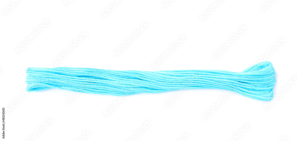 Fototapeta premium Light blue embroidery thread on white background