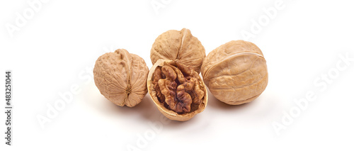 Walnuts with kernel, isolated on white background.