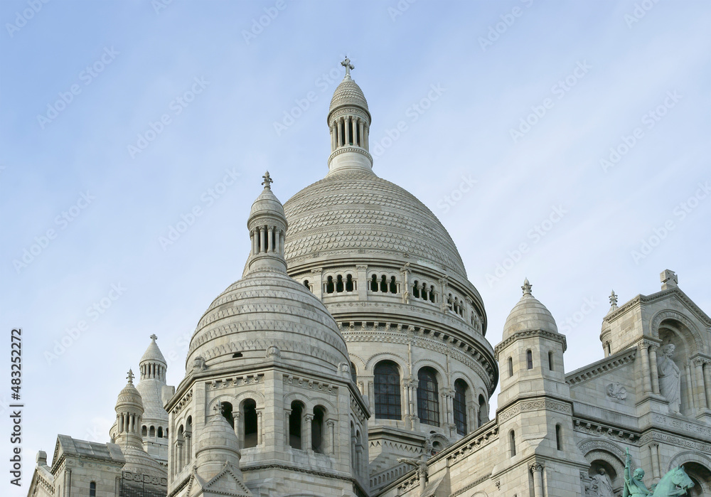 The Basilica of the Sacred Heart of Paris, commonly known as Sacre-Coeur Basilica, located in the Montmartre district of Paris, France