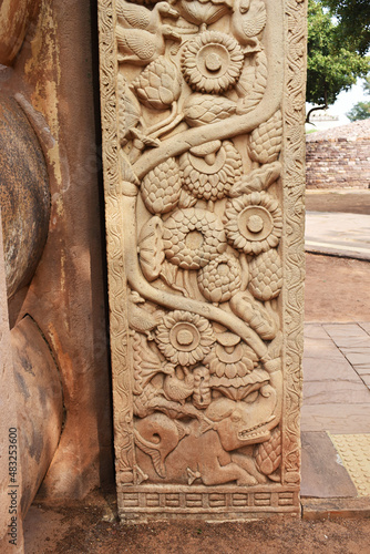 Stupa No 1, East Gateway. Left Pillar, Outside face: Floral decoration and a makara or crocodile at the bottom from whose mouth vine of a tree emerges. The Great Stupa, World Heritage Site, Sanchi