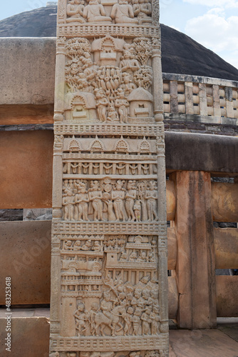 Stupa No 1, North Gateway, Left Pillar, Front Face  Panel 4 : Royal procession of King Prasenjit  Panel 3 : Chankama Promenade where Buddha walked. Panel 2 : Jetavana and Story of Anathapindaka. photo