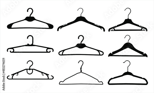 a set of clothes hangers, badges