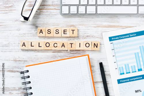 Asset allocation concept with letters on cubes.