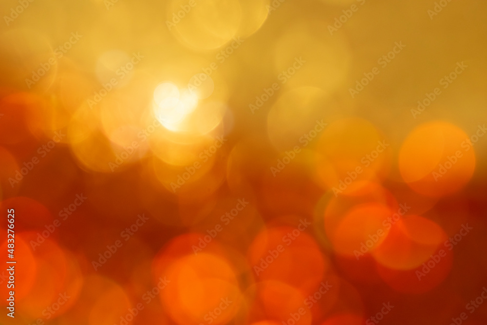 Fototapeta premium Gold bokeh texture. Festive glitter background with defocused lights