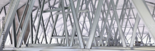 Structure of steel roof frame for building construction closeup