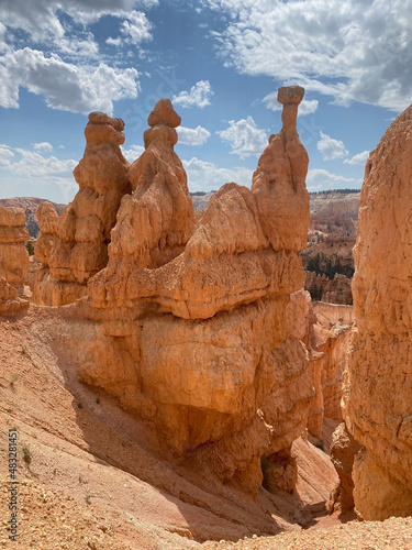 Hiking deep into Bryce Canyon and looking up adds wonderment to the natural beauty surrounding this traveler © Leslie Rogers Ross