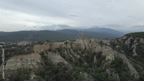 Aerial: Sandstone, clay erode into fantastic steep hoodoo formations photo