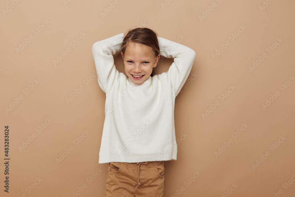 cute girl in white sweater posing hand gestures Lifestyle unaltered cute girl in white sweater posing hand gestures Lifestyle unaltered