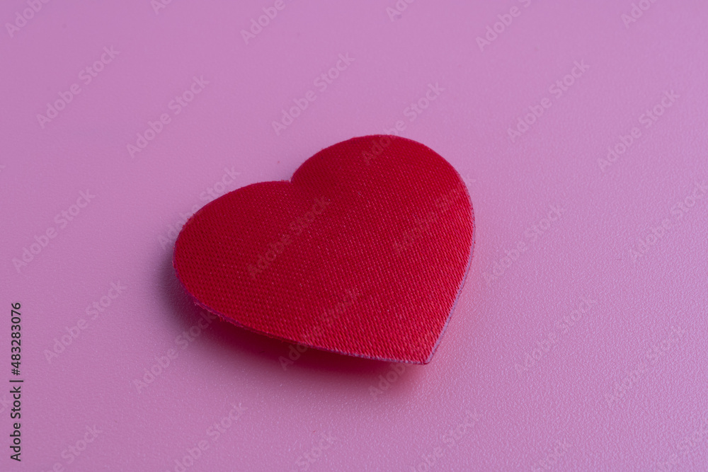A lone, red, heart made of fabri A lone, red, heart made of fabri