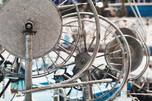 Net winches of small fishing boats, industrial photo