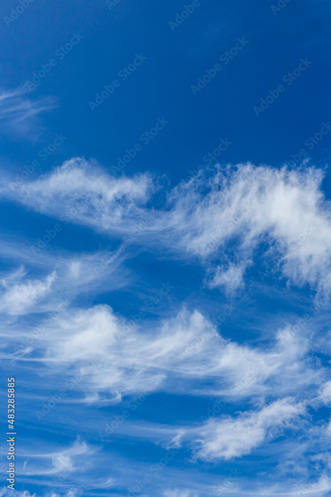 Fototapeta premium Cirrus and Stratus clouds in dramatic blue sky over Cape Town
