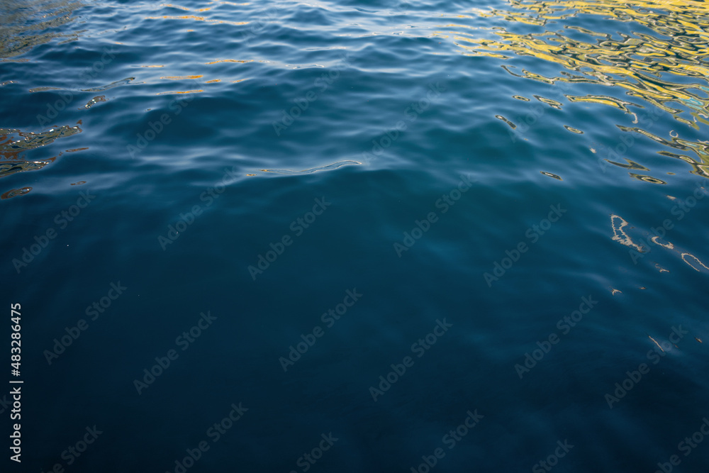 Blue water in the sea with ripples and reflection. Summer rest Blue water in the sea with ripples and reflection. Summer rest