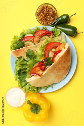 Concept of tasty food with pita with chicken, top view