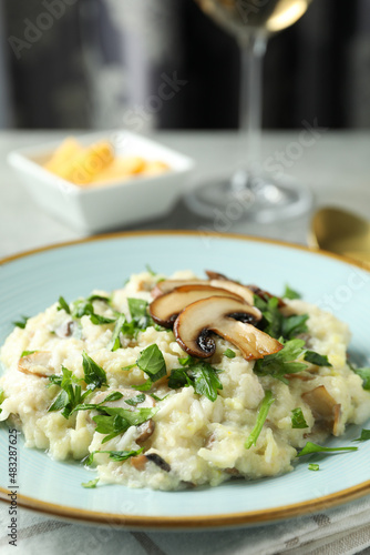 Concept of tasty food with risotto with mushrooms, close up
