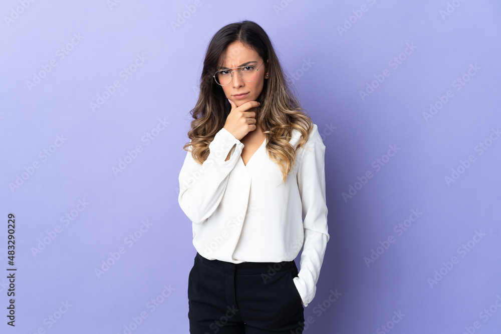 Young caucasian woman isolated on purple background thinking Young caucasian woman isolated on purple background thinking
