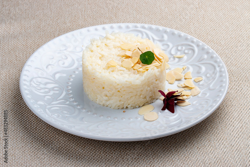 Boiled rice with almonds. Classic side dish