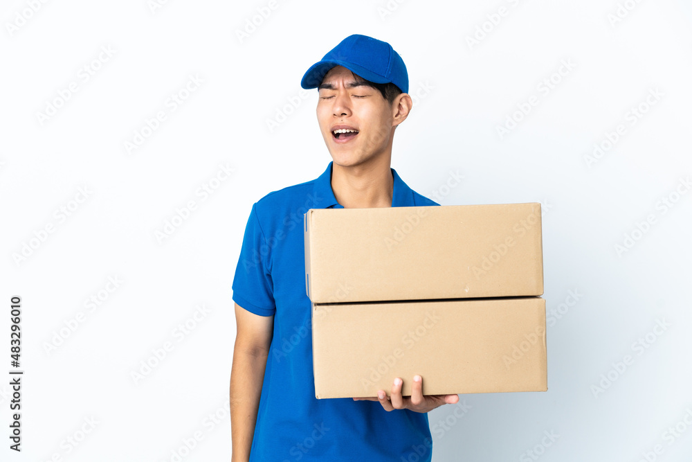 Delivery Chinese man isolated on white background laughing Delivery Chinese man isolated on white background laughing