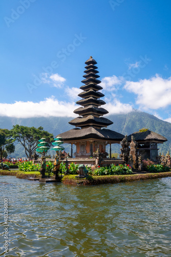 Bali water temple on Bratan Lake is the most beautiful temple in Bali, Indonesia. Pura Ulun Danu Beratan Temple, or Pura Bratan is located by the lake and surrounded by forested mountains.