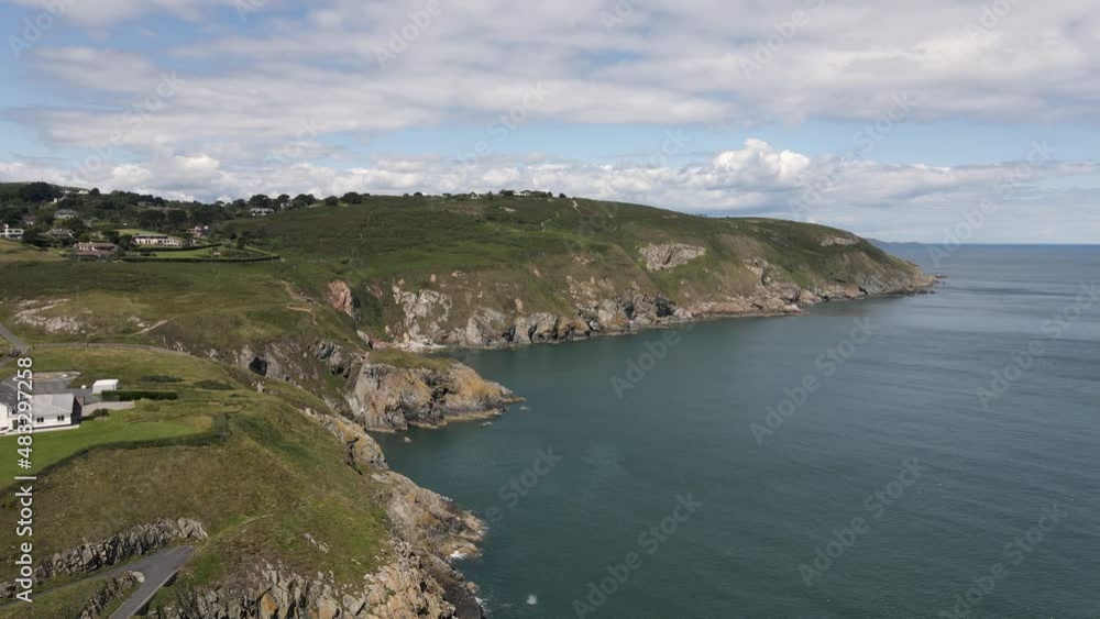 Drone shot of cliffs over looking the ocean in Dublin, Ireland. Drone shot of cliffs over looking the ocean in Dublin, Ireland.