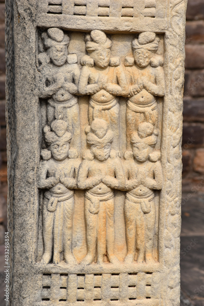 Stupa No 3, Front Face, Panel 2 and 3 on both pillars. Devotees worshipping Buddha. World Heritage Site, Sanchi, Madhya Pradesh, India.