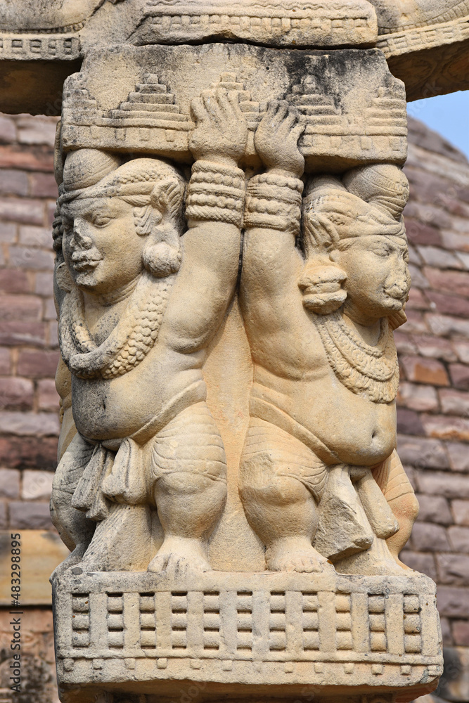 Stupa No 3,  Dwarfs uphold the Pillars. World Heritage Site, Sanchi, Madhya Pradesh, India.
