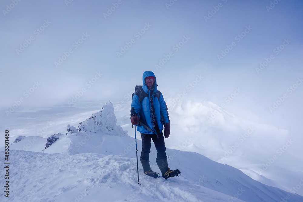 Hiker at the Avachinsky Pass and volcanoes in Kamchatka