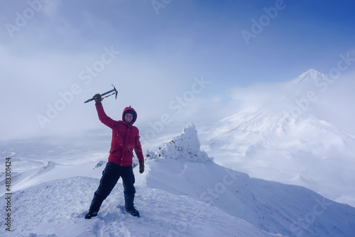 Hiker with an ice ax at the Avachinsky Pass