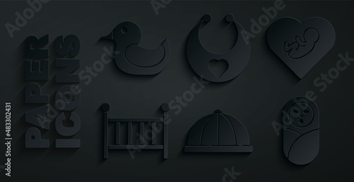 Set Baby hat, inside heart, crib cradle, Newborn baby infant swaddled, bib and Rubber duck icon. Vector