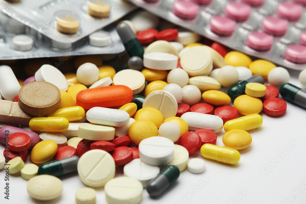 Different colorful tablets at white background Different colorful tablets at white background
