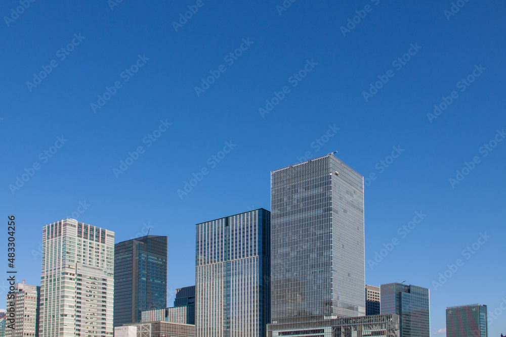 High-rise business buildings under the blue sky