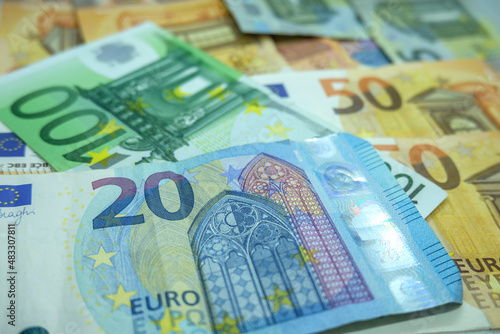 Sfondo con Euro in banconota sparsi, tanti soldi  photo