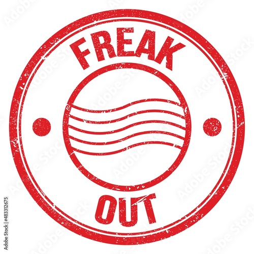 Fotografie FREAK OUT text on red round postal stamp sign