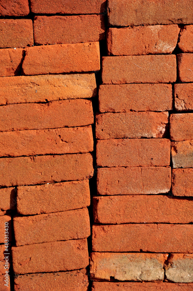 Fototapeta premium Detail close-up red brick background texture vertikal