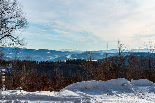View from hiking trail bellow Velka Cantoryje hill summit in winter Slezske Beskydy mountains in Czech republic