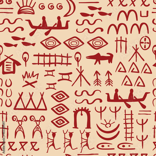 Ethnic tribal symbols and ornaments of indigenous peoples seamless pattern.