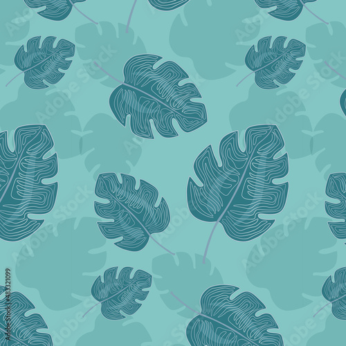 Vector seamless pattern with palm leaves. The template is a textile pattern of palm leaves.