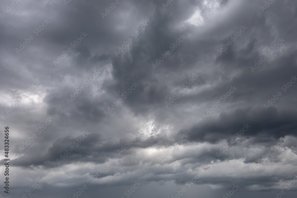 Dark gray clouds. Storm clouds background Dark gray clouds. Storm clouds background